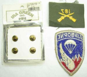 187th RCT KOREA shoulder patch and officers color sew on cross rifles for the collar.