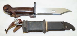 AKM Wirecutter sawback bayonet with MATCHING scabbard and frog and handstrap.