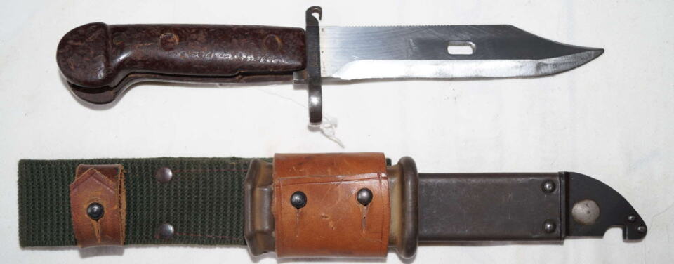 AKM Wirecutter sawback bayonet with scabbard and frog.