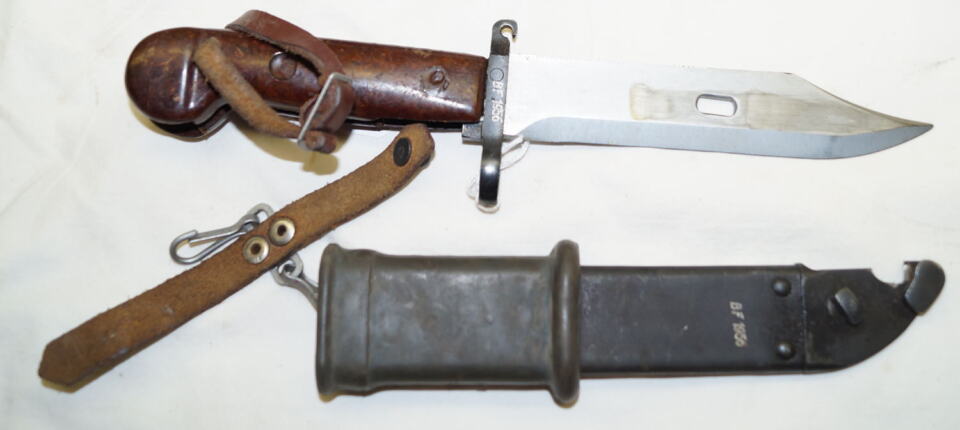 AKM Wirecutter sawback bayonet with MATCHING scabbard and frog and handstrap.