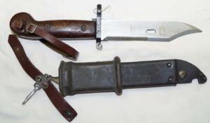AKM Wirecutter sawback bayonet with MATCHING scabbard and frog and handstrap.