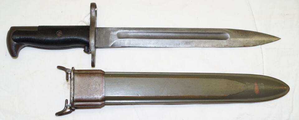 M1 bayonet with M7 (M3A1) scabbard.