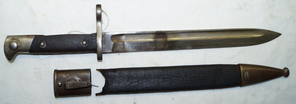 M1892/93 Humpback bayonet with broken scabbard.