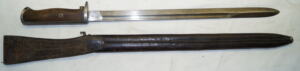 M1916 bayonet with full length blade and early M1894/12 LONG LEATHER scabbard and frog.