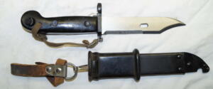 AKM sawback/wire cutter Bayonet with scabbard and frog and hand lanyard.