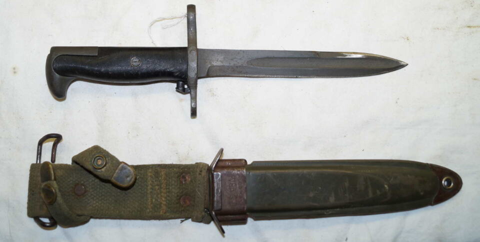 ROK M5 bayonet with M8A1 scabbard (Cut down M1) The female snap on the scabbard’s retaining strap is crushed and will not snap shut.