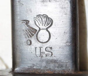 M1917 bayonet with leather tab scabbard.