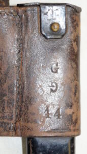 M1873 Triform socket bayonet with scabbard and leather frog.