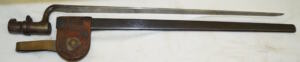 M1873 Triform socket bayonet with scabbard and brass hook.
