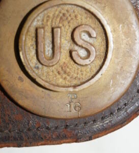 M1873 Triform socket bayonet with scabbard and brass hook.