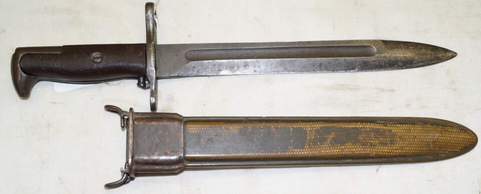 M1 bayonet with M7 (M3A1) scabbard.