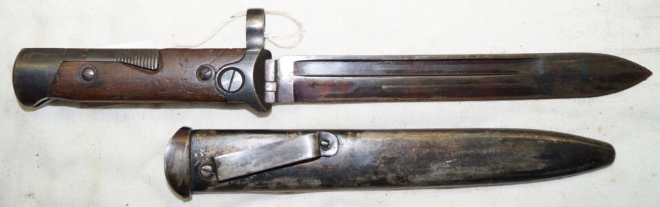 M1938 Carcano LATCH LOCK folding bayonet with belt loop scabbard.