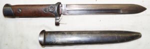M1938 Carcano LATCH LOCK folding bayonet with belt loop scabbard.