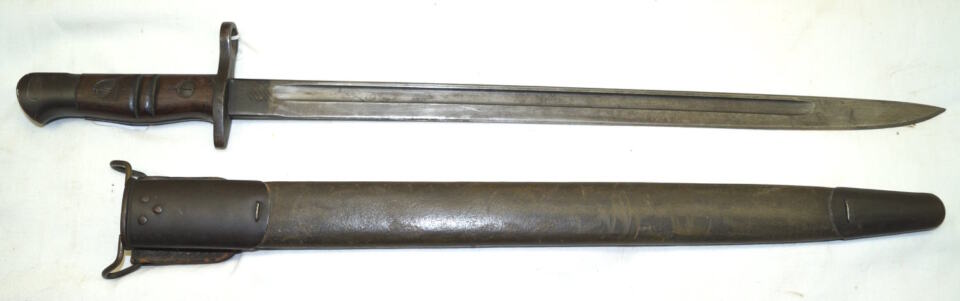 M1917 bayonet with leather tab scabbard.