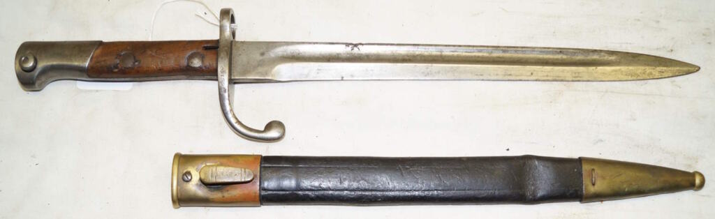 M1908 bayonet with brass bound leather scabbard.