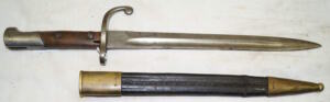 M1908 bayonet with brass bound leather scabbard.