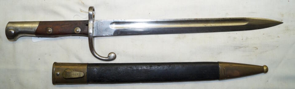 M1908 bayonet with brass bound leather scabbard.