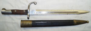 M1908 bayonet with brass bound leather scabbard.