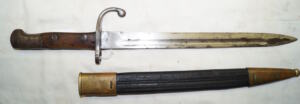 M1908 bayonet with brass bound leather scabbard.