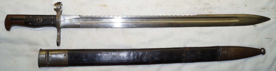 M1878 Vetterli sawback bayonet with M1881 scabbard.