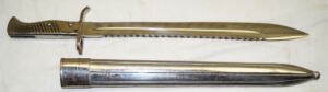Rivetted hilt ersatz sawback bayonet with scabbard.