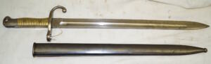 M1891 BRASS gripped bayonet with first pattern scabbard.