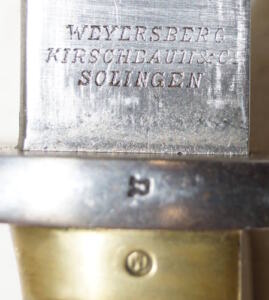 M1891 BRASS gripped bayonet with first pattern scabbard.