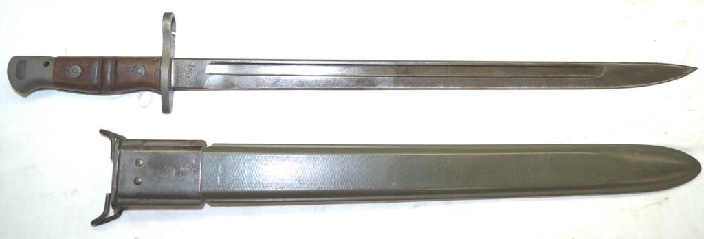 WWII M1917 Trenchgun bayonet with correct flaming bomb M-1917 marked scabbard.
