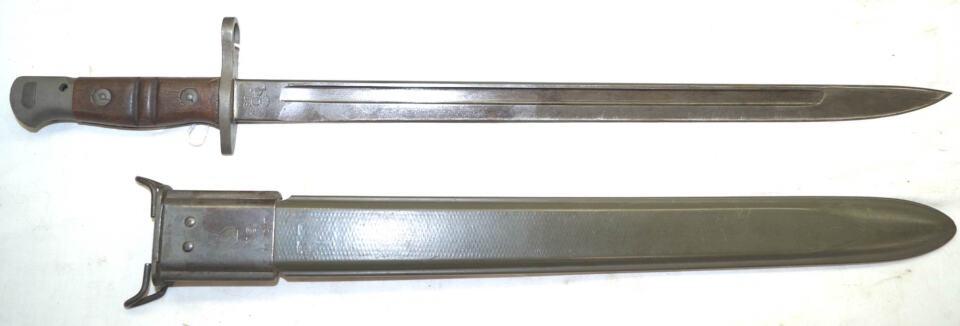 WWII M1917 Trenchgun bayonet with correct flaming bomb M-1917 marked scabbard.