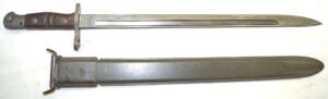 WWII M1917 Trenchgun bayonet with correct flaming bomb M-1917 marked scabbard.