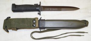 Haitian contract M5A1 bayonet with scabbard and leg tie.