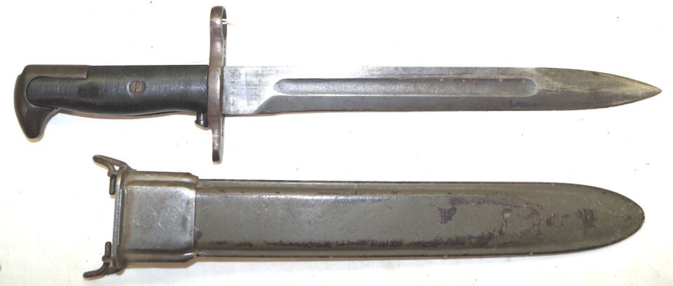 M1 bayonet with M7 (M3A1) scabbard.