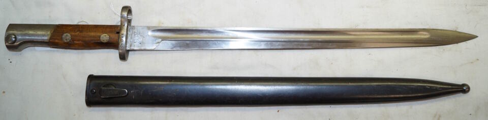 M1924b “Mexican Model” bayonet with matching scabbard.