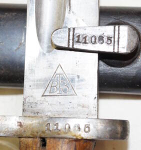 M1924b “Mexican Model” bayonet with matching scabbard.
