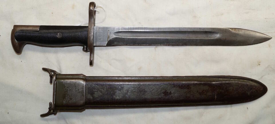 M1 bayonet with M7 (M3A1) scabbard.