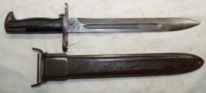 M1 bayonet with M7 (M3A1) scabbard.