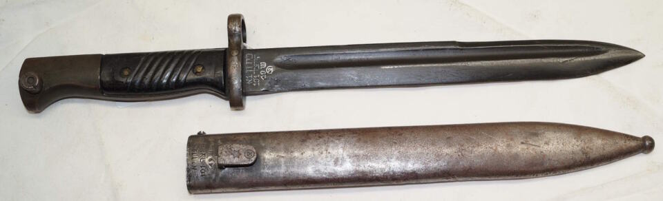 M1949 bayonet with scabbard.