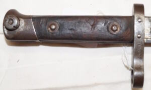 Y:1903/14 bayonet Star marked ricasso BREDA Blade is dark with some pitted spots.