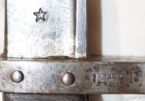 Y:1903/14 bayonet Star marked ricasso BREDA Blade is dark with some pitted spots.