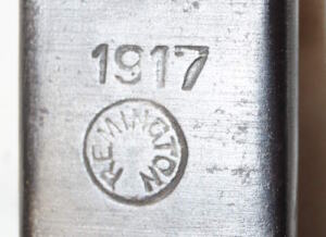 M1917 bayonet with tab type scabbard.