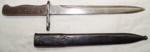 Turkish Specific solid machined hilt ersatz bayonet with scabbard.