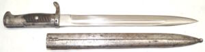 Ersatz bayonet with scabbard and wood grip inserts.