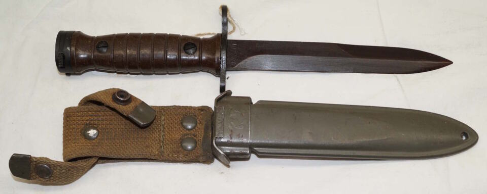 Italian produced M4 bayonet with PLASTIC scabbard and grips.