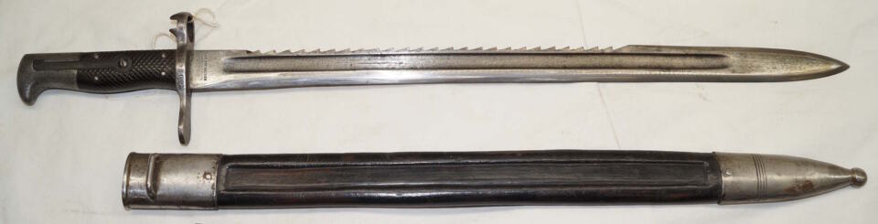 M1878 Vetterli sawback bayonet with M1881 scabbard.
