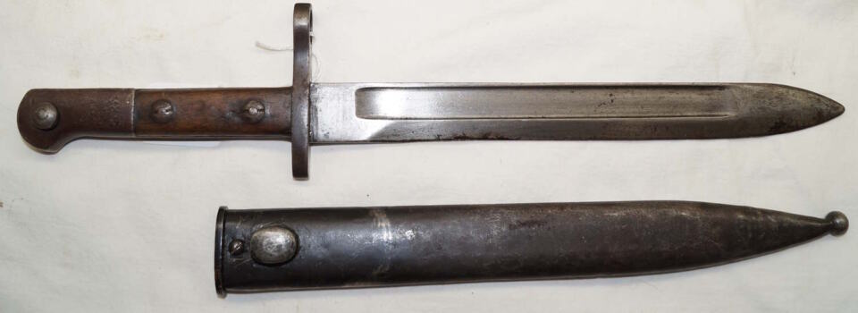 M1935 LONG POMMEL bayonet with scabbard.