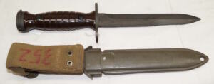 Italian produced M4 bayonet with PLASTIC scabbard and grips.