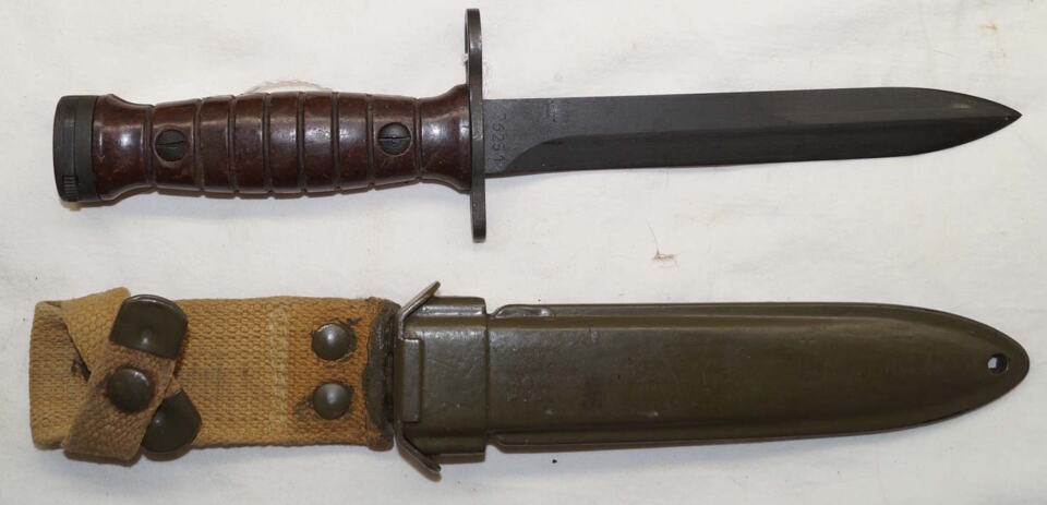 Italian produced M4 bayonet with PLASTIC scabbard and grips.