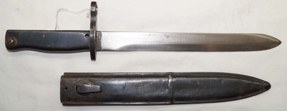 Pressed Hilt Ersatz bayonet with scabbard.