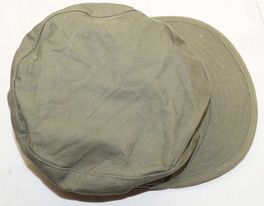 Original US M1951 Field cap size 7 3/4 Unissued but has storage stain (pictured)