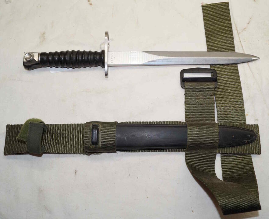 Swiss STG57 bayonet with scabbard and Iraqi made MOLLE web rig.